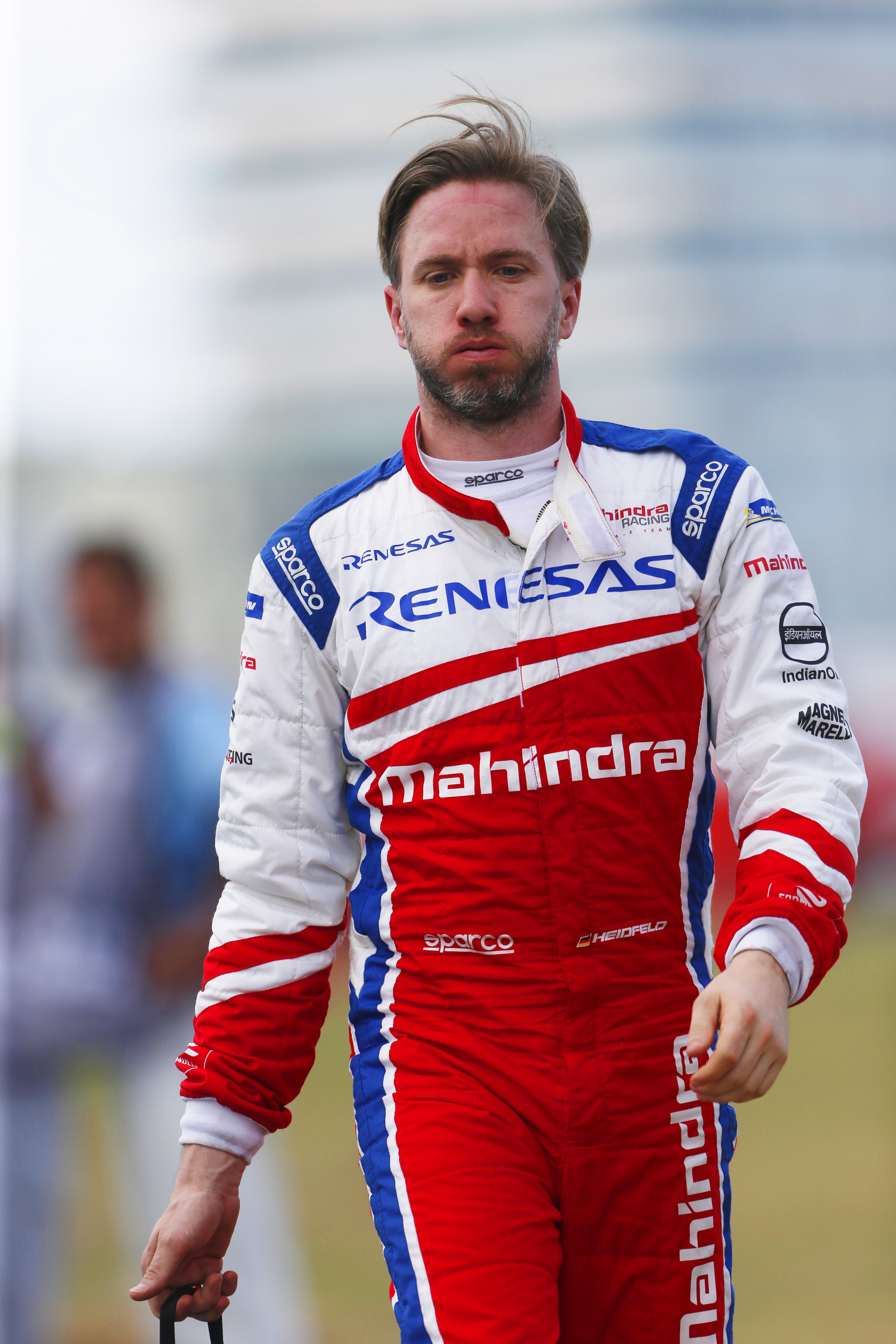 Nick Heidfeld (GER), Mahindra Racing, Mahindra M4Electro, walks back to the pits after retiring from the race.