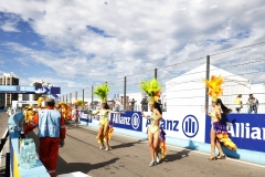 Dancers perform in the pre race build up.