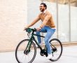 Swytch eBike Conversion Kit – Man Riding Side on Swytch Bike.dng